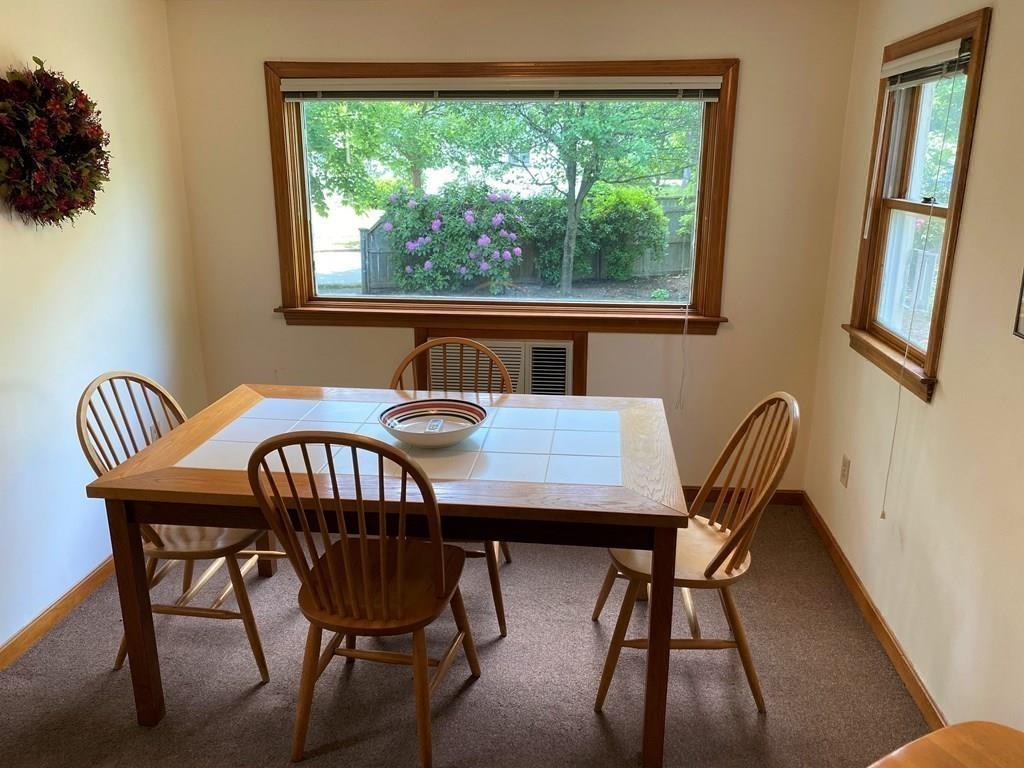 25 Clearwater Road Newton, MA 02462 - Photo 10 of 23 a view of a dining room with furniture window and outside view