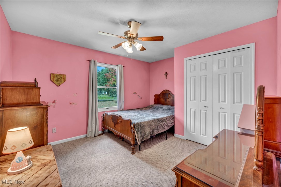 18945 Thorpe Road Chagrin Falls, OH 44023 - Photo 35 of 35 Carpeted bedroom with a ceiling fan and a closet