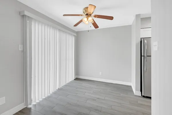 a kitchen with a refrigerator sink and stove