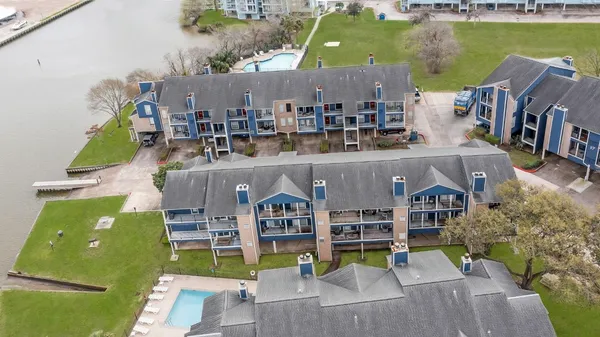 an aerial view of a city with lake view