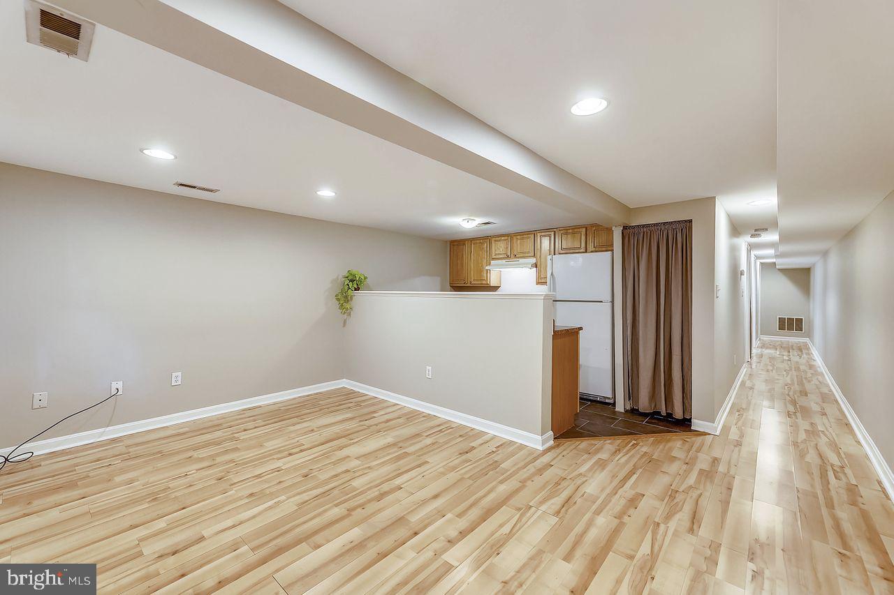 918 8th Street Northeast Washington, DC 20002 - Photo 28 of 36 Basement kitchen overlooks the living room