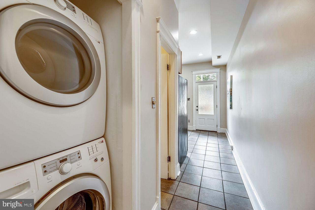918 8th Street Northeast Washington, DC 20002 - Photo 8 of 36 Washer/dryer in the hallway to the kitchen