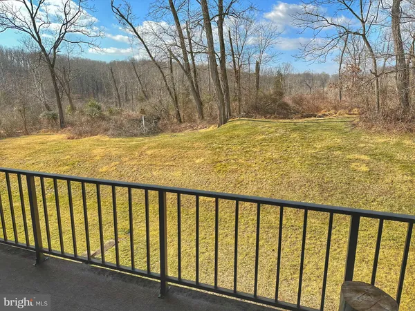 a view of swimming pool with a yard