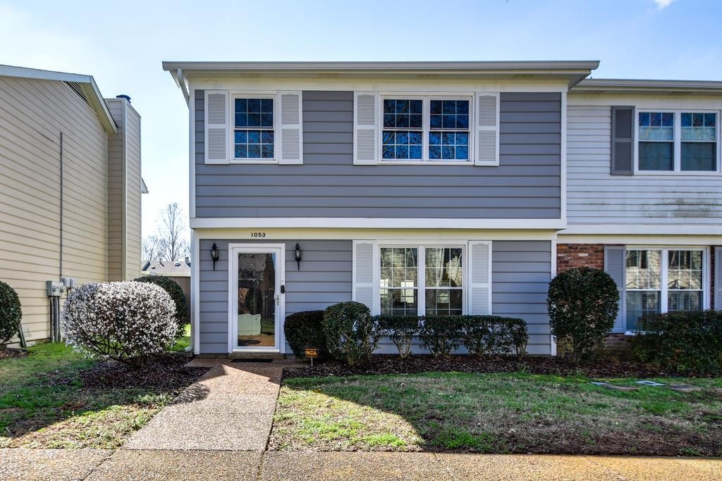 1053 General George Patton Road Nashville, TN 37221 - Photo 1 of 1 a front view of a house with garden
