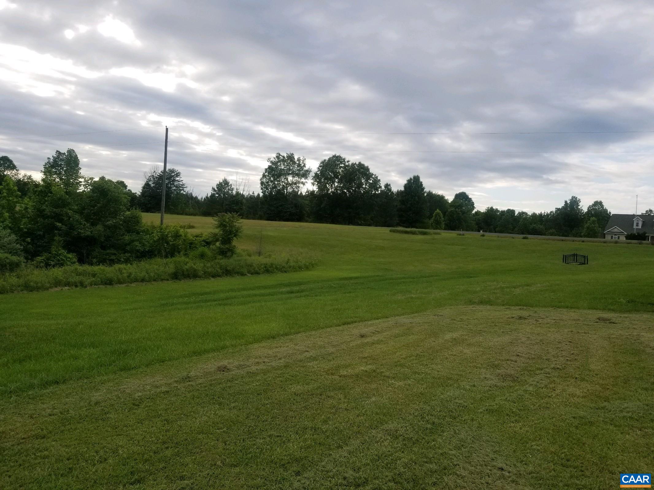 1144 Carter Road Farmville, VA 23901 - Photo 7 of 7 a view of a golf course with a lake