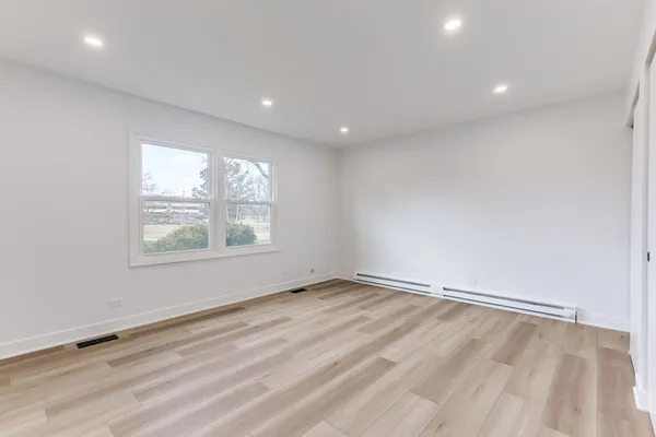 an empty room with windows