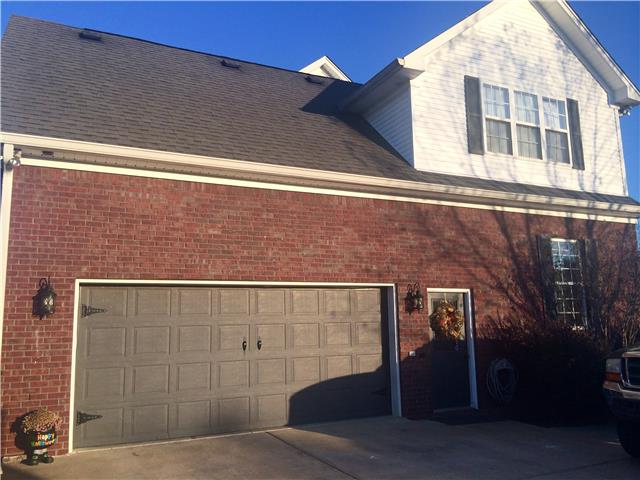 1101 Powell Grove Road Lebanon, TN 37090 - Photo 5 of 19 2 Car Side Entry Garage , Post Lighting at entrance of driveway, huge amount of parking space , Landscape lighting that shines right up on the house at night.