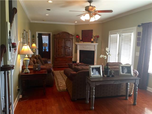 1101 Powell Grove Road Lebanon, TN 37090 - Photo 10 of 19 Beautiful Living Room with Gas Fireplace and Crown Moulding throughout the house