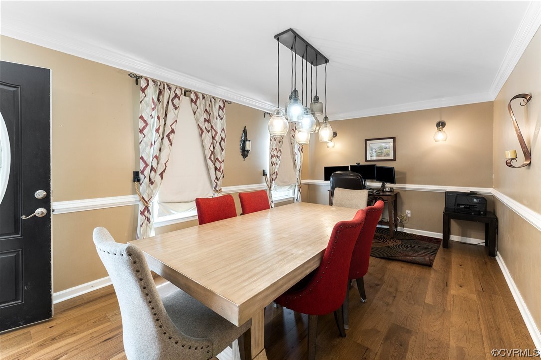 4717 Crossgate Road Chester, VA 23831 - Photo 15 of 34 a view of a dining room with furniture and wooden floor
