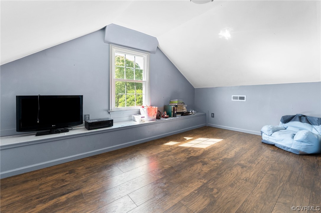 4717 Crossgate Road Chester, VA 23831 - Photo 30 of 34 a living room with furniture and a flat screen tv