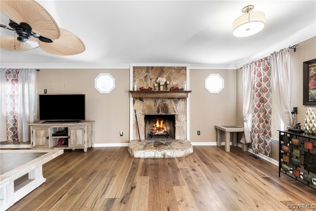 4717 Crossgate Road Chester, VA 23831 - Photo 6 of 34 a living room with furniture and a flat screen tv