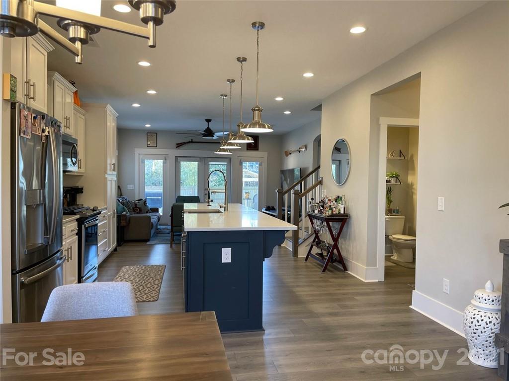 3508 Ritch Avenue Charlotte, NC 28206 - Photo 3 of 33 a view of a living room and kitchen