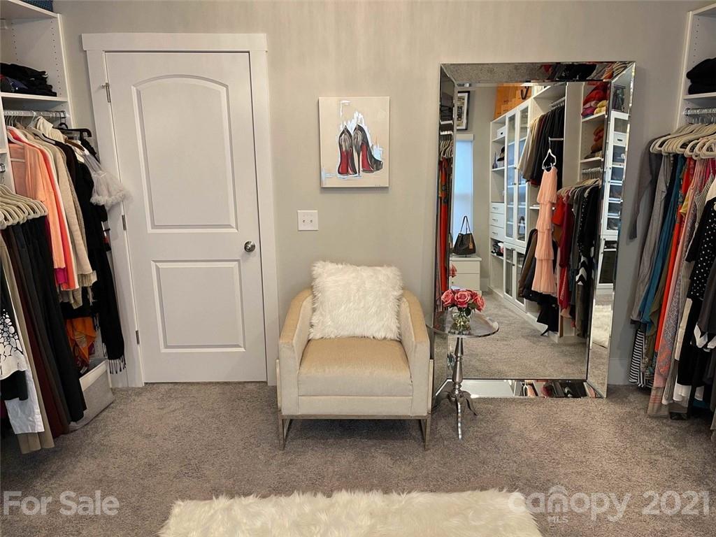 3508 Ritch Avenue Charlotte, NC 28206 - Photo 9 of 33 a view of walk in closet with clothes and shoes