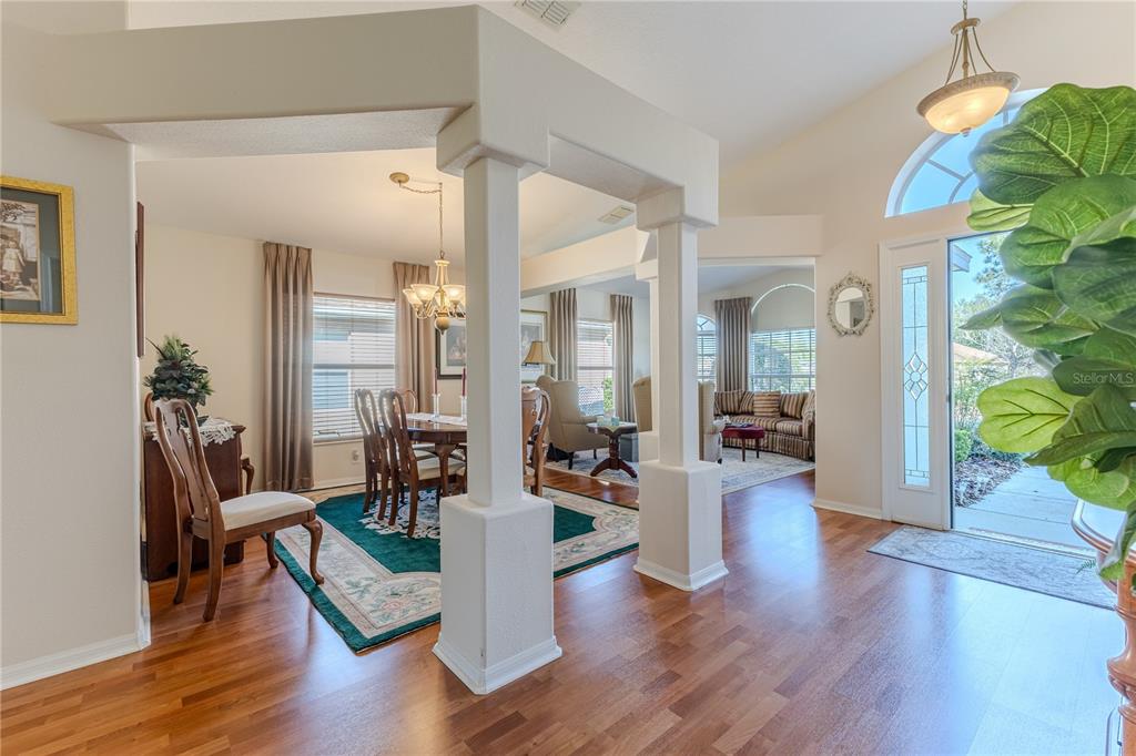 150 Gordham Court Spring Hill, FL 34609 - Photo 12 of 71 a living room with furniture and a wooden floor