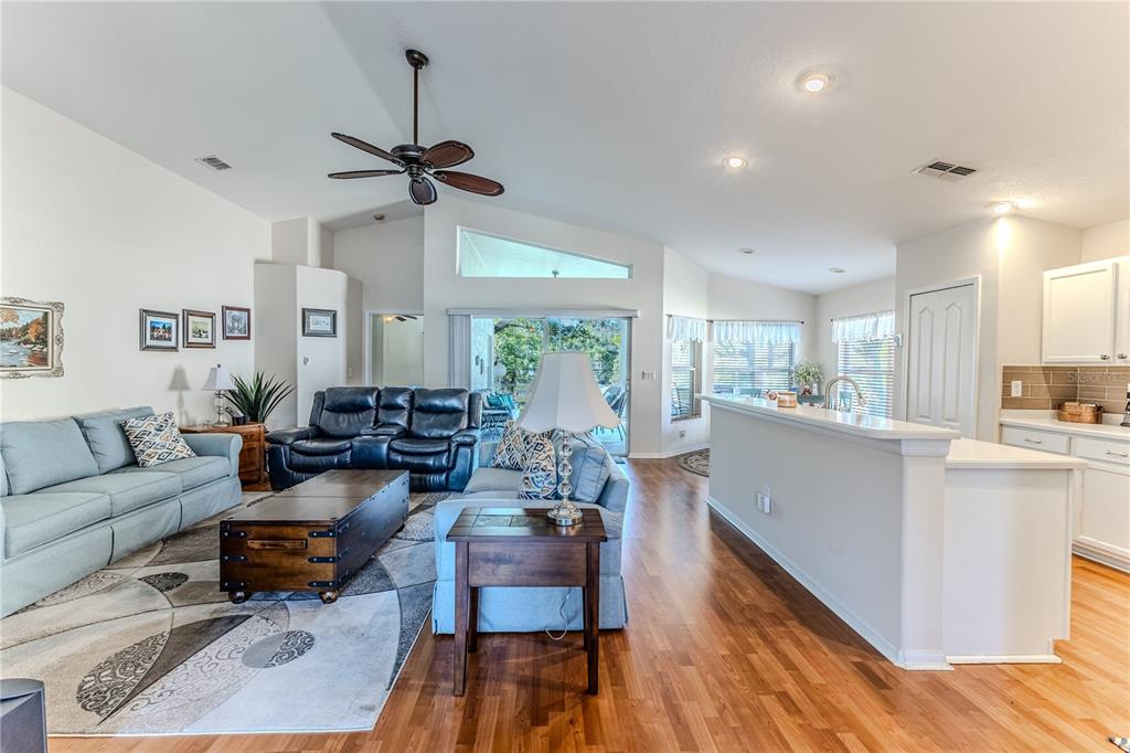 150 Gordham Court Spring Hill, FL 34609 - Photo 16 of 71 a living room with furniture and a large window