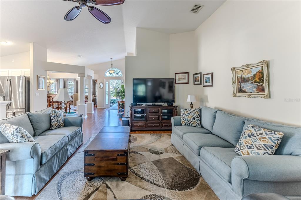 150 Gordham Court Spring Hill, FL 34609 - Photo 19 of 71 a living room with furniture and a flat screen tv