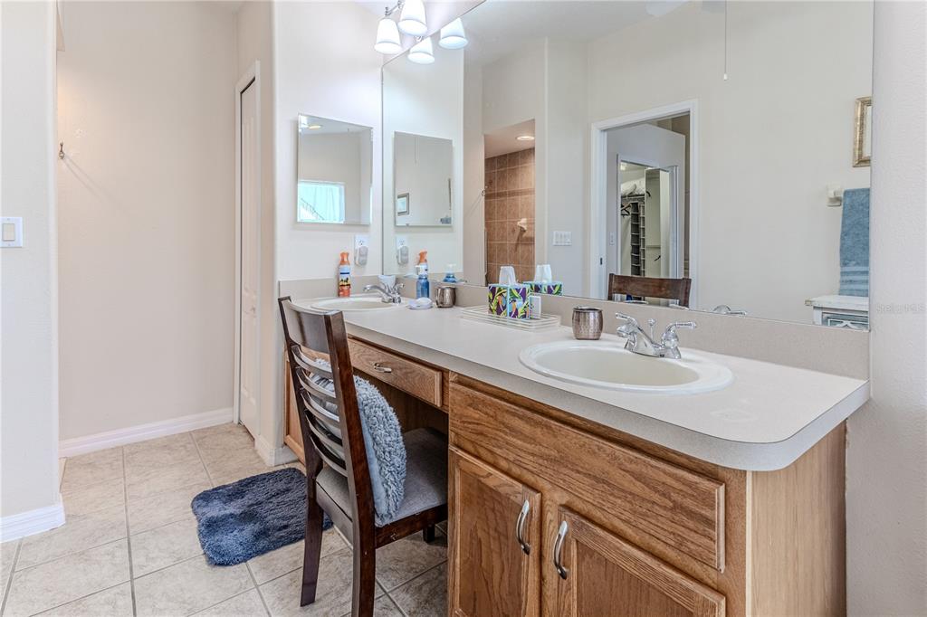 150 Gordham Court Spring Hill, FL 34609 - Photo 41 of 71 a sink and a table in a room