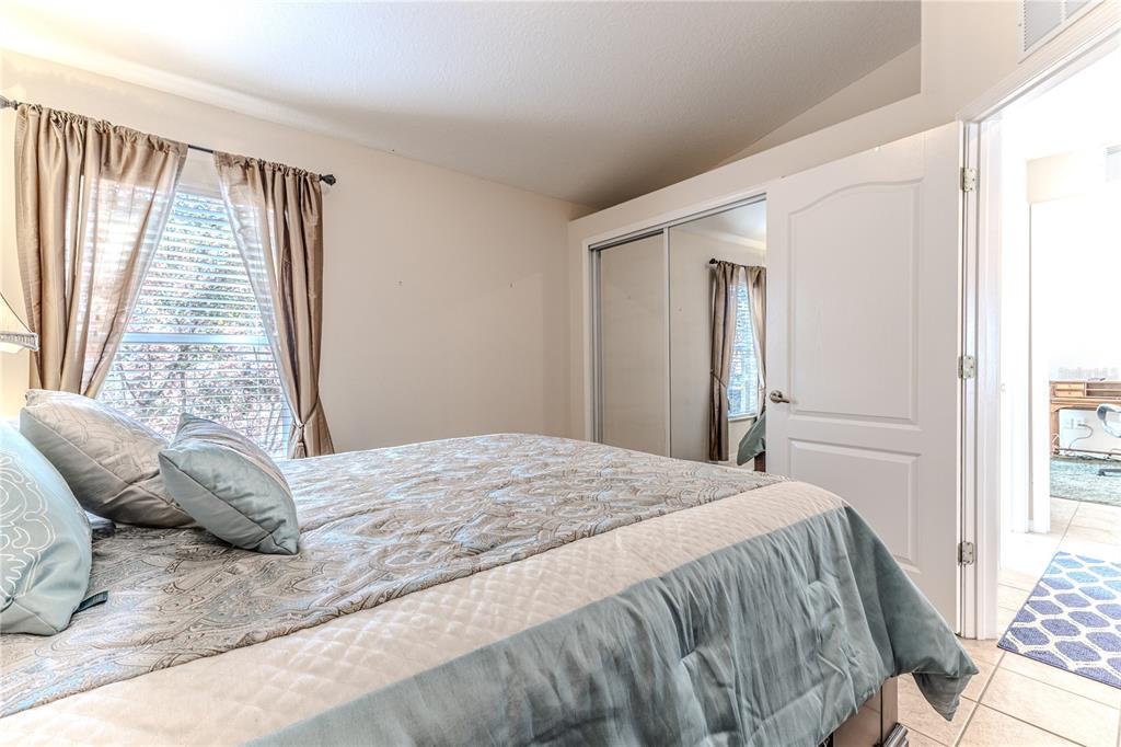 150 Gordham Court Spring Hill, FL 34609 - Photo 52 of 71 a bedroom with a bed and a window