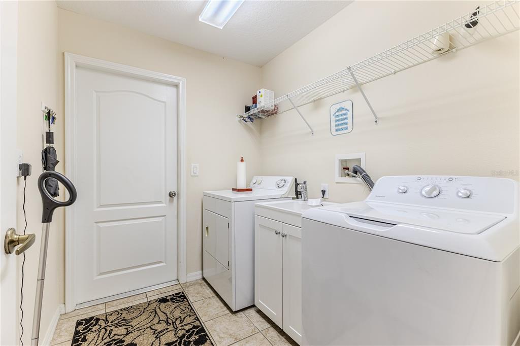 150 Gordham Court Spring Hill, FL 34609 - Photo 54 of 71 a utility room with dryer and washer