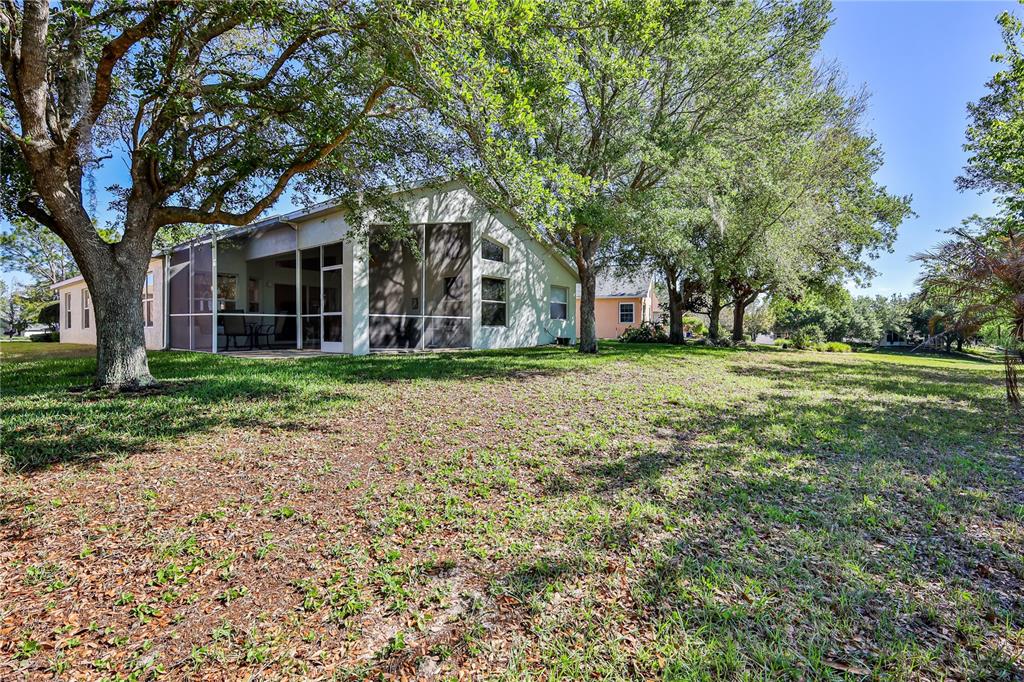 150 Gordham Court Spring Hill, FL 34609 - Photo 59 of 71 a front view of a house with a garden