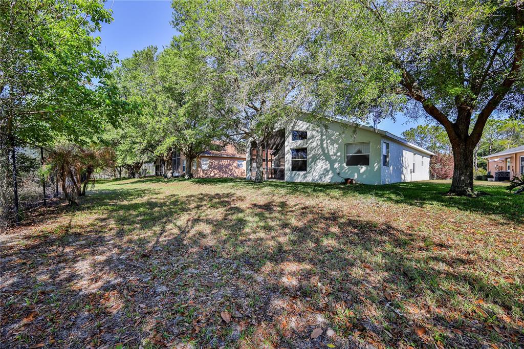 150 Gordham Court Spring Hill, FL 34609 - Photo 61 of 71 a view of a house with a yard