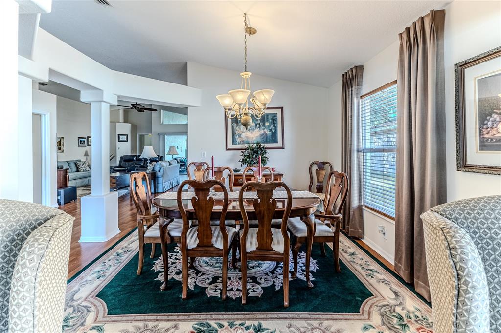 150 Gordham Court Spring Hill, FL 34609 - Photo 7 of 71 a view of a dining room with furniture and window