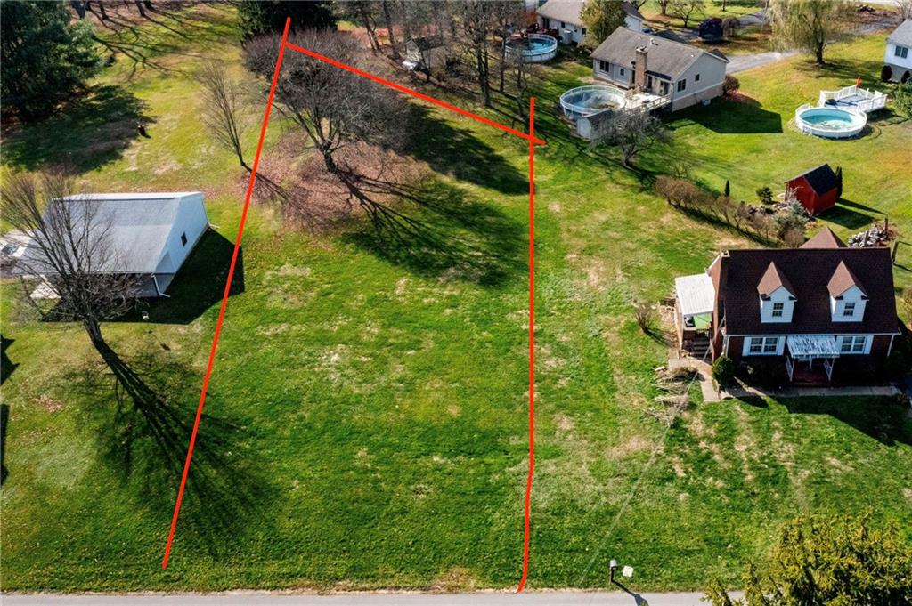 -lot Tuscarawas Road Beaver, PA 15009 - Photo 3 of 9 a view of a back yard of the house and swimming pool