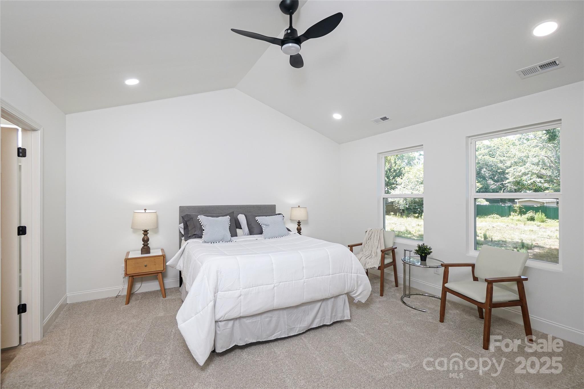 3224 Sam Wilson Road Charlotte, NC 28214 - Photo 20 of 32 a bedroom with a bed and a window