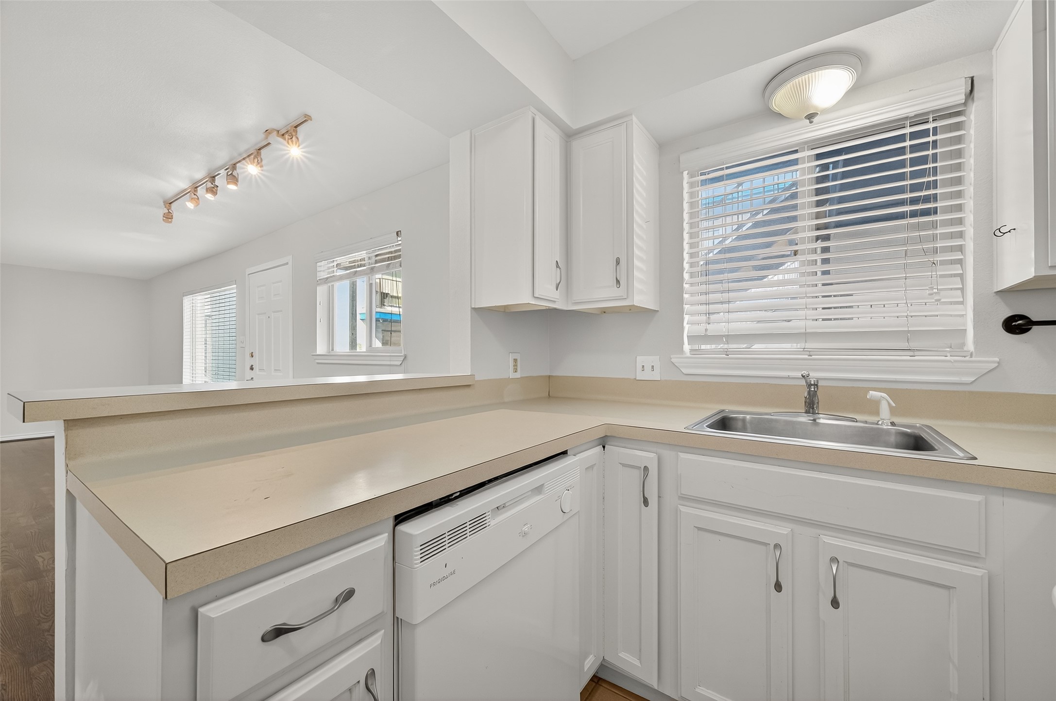 2020 Huldy Street, Unit 1 Houston, TX 77019 - Photo 20 of 30 a kitchen with white cabinets and sink