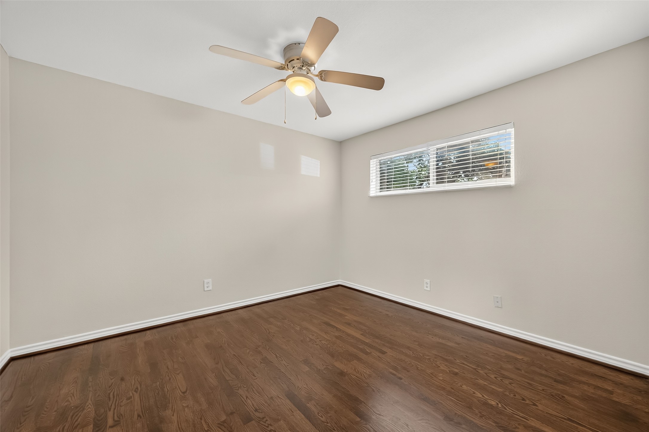 2020 Huldy Street, Unit 1 Houston, TX 77019 - Photo 26 of 30 a view of an empty room with wooden floor