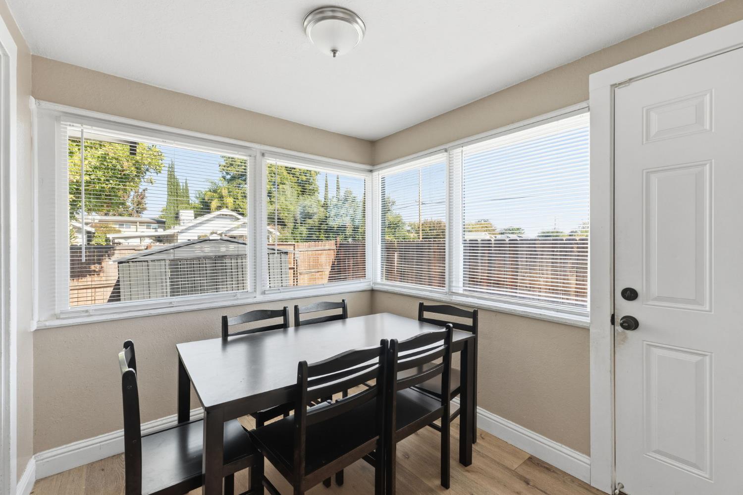 321 North Orange Avenue Exeter, CA 93221 - Photo 12 of 37 a view of a dining room with furniture window and outside view