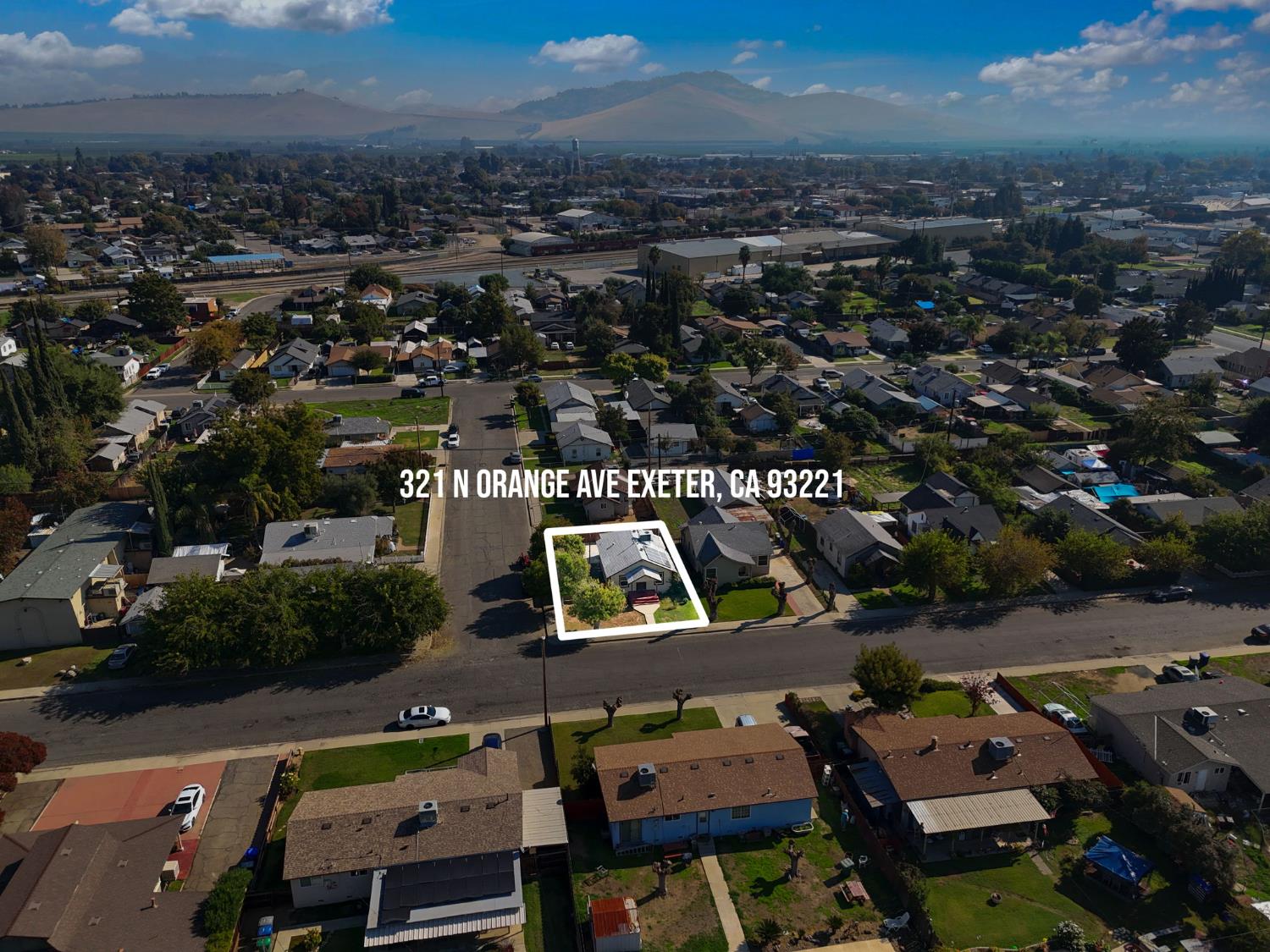 321 North Orange Avenue Exeter, CA 93221 - Photo 26 of 37 an aerial view of a city