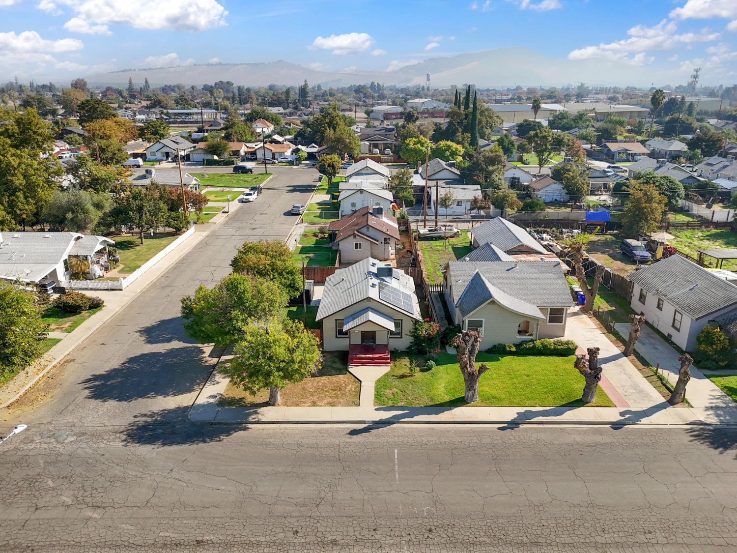 321 North Orange Avenue Exeter, CA 93221 - Photo 27 of 37 an aerial view of residential houses with outdoor space
