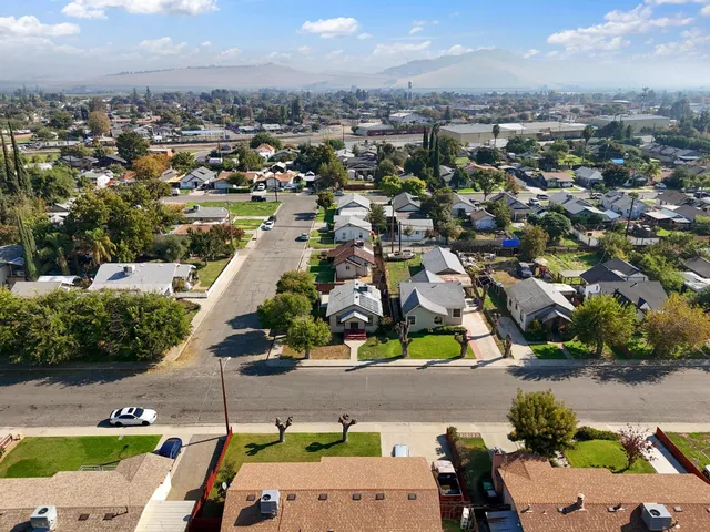 an aerial view of a city with lots of residential buildings