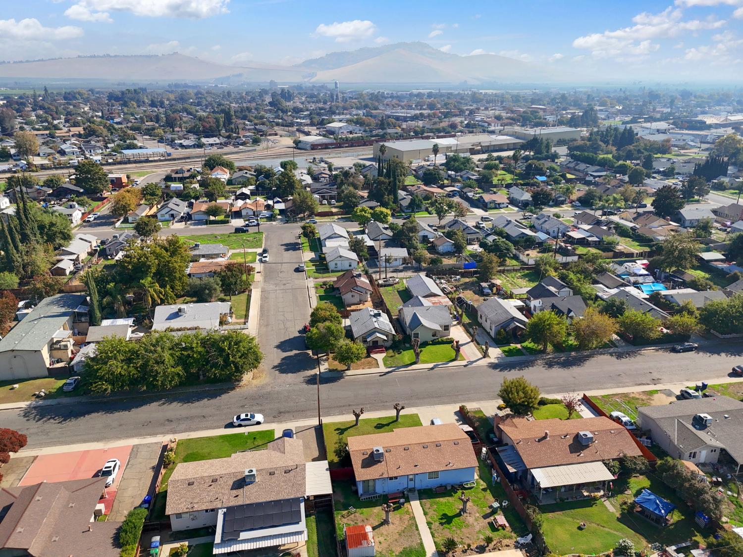 321 North Orange Avenue Exeter, CA 93221 - Photo 32 of 37 an aerial view of a houses with a lake view