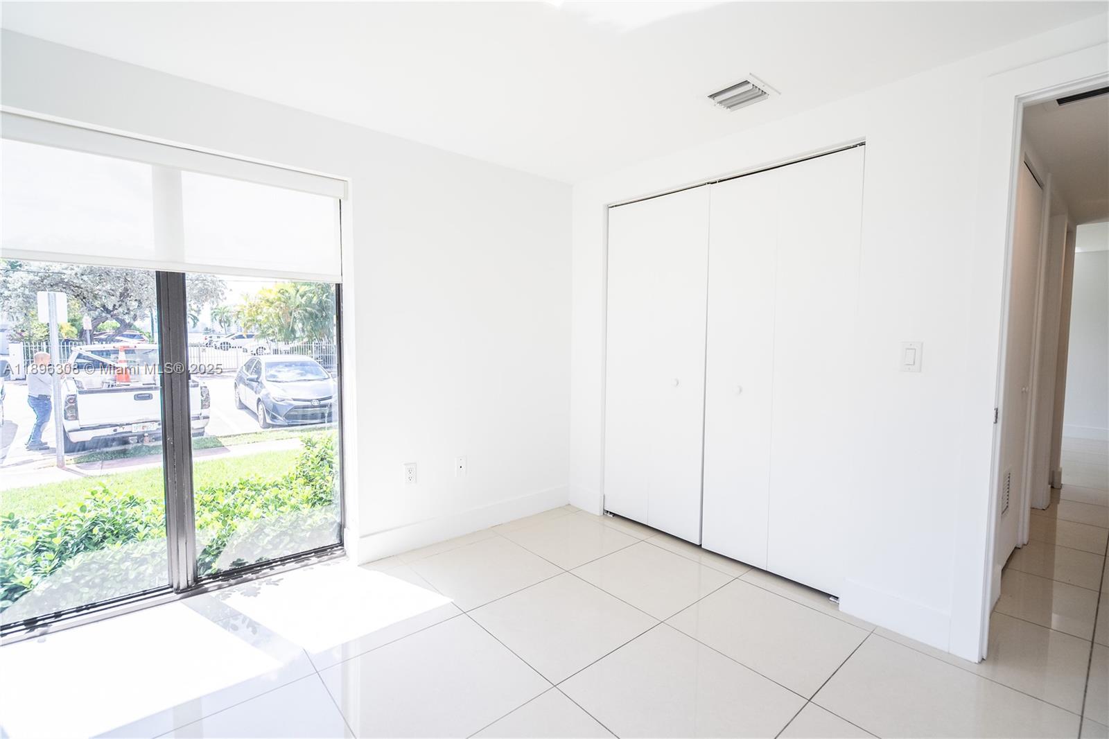1971 Bay Drive, Unit 102 Miami Beach, FL 33141 - Photo 11 of 24 a view of a room that has a window in it