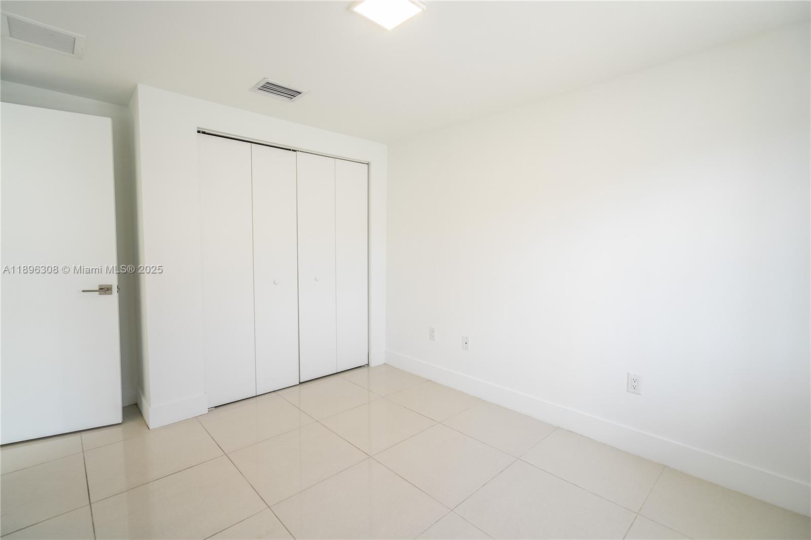 1971 Bay Drive, Unit 102 Miami Beach, FL 33141 - Photo 13 of 24 a view of an empty room