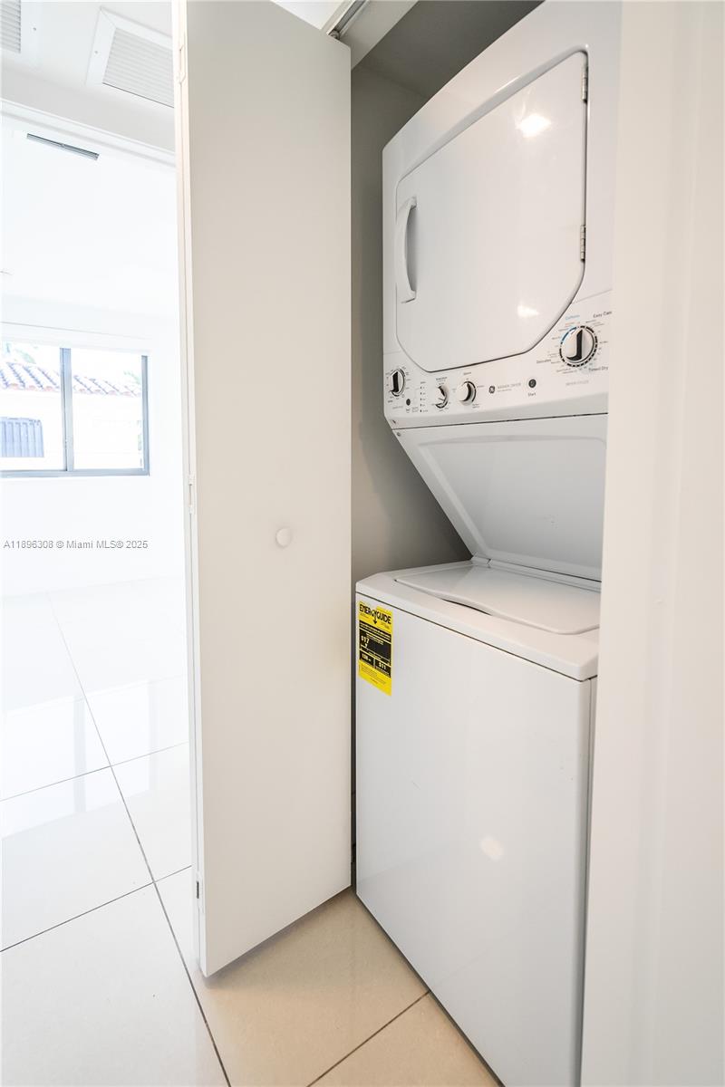 1971 Bay Drive, Unit 102 Miami Beach, FL 33141 - Photo 18 of 24 a utility room with dryer and washer