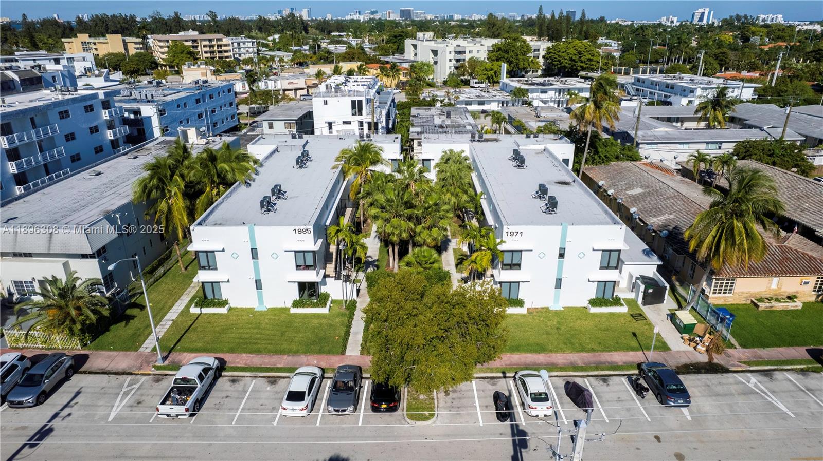1971 Bay Drive, Unit 102 Miami Beach, FL 33141 - Photo 23 of 24 an aerial view of a house with a yard and lake view