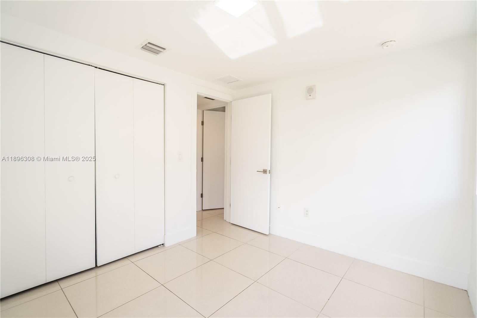 1971 Bay Drive, Unit 102 Miami Beach, FL 33141 - Photo 10 of 24 a view of an empty room