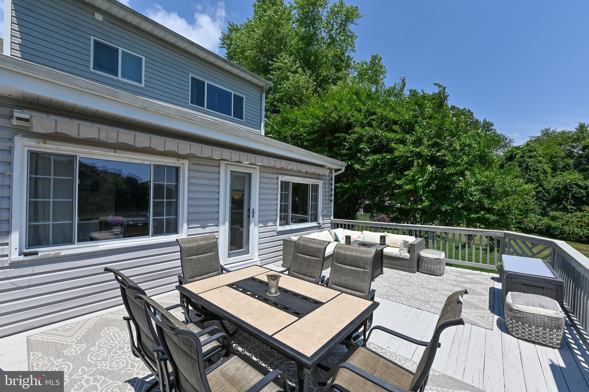 1230 Rock Hill Road Pasadena, MD 21122 - Photo 8 of 69 Motorized awning can shade deck