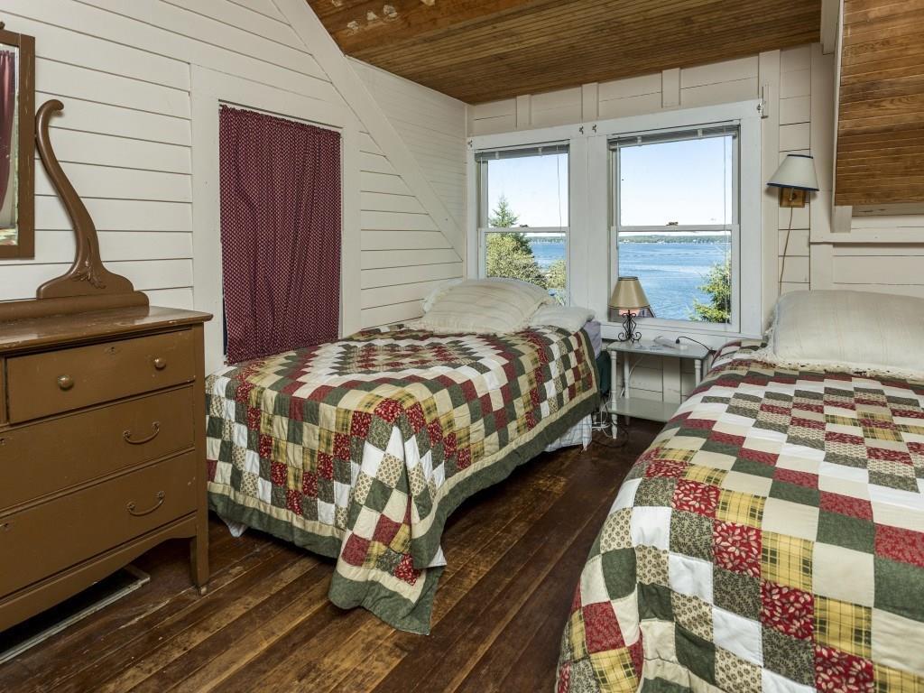 153-260 Van Horn Road East Boothbay, ME 04544 - Photo 21 of 25 Guest bedroom with with pine floor
