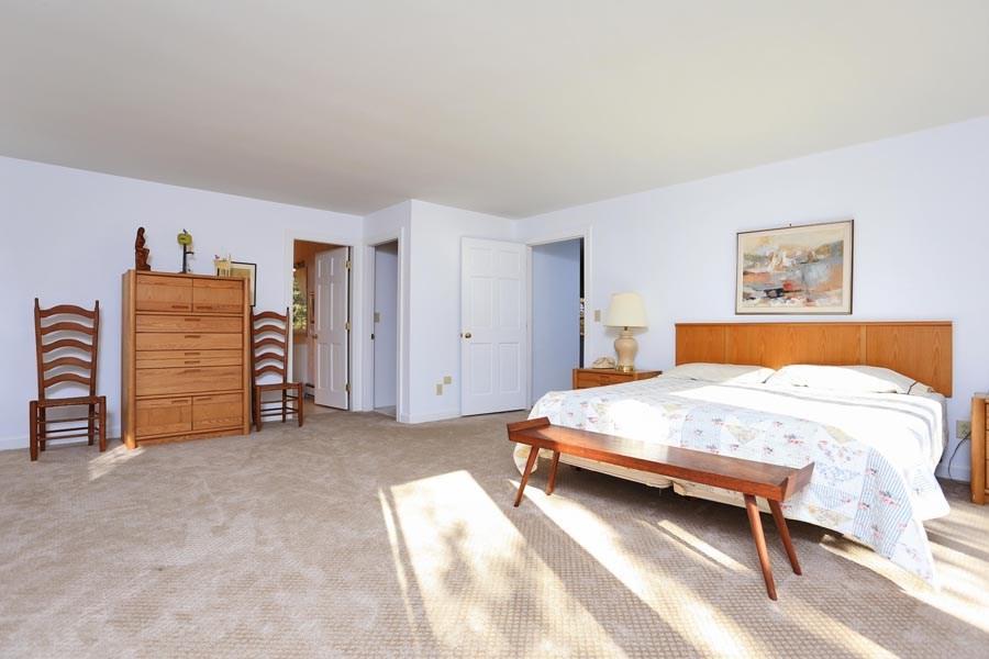 38-40 Wolf Road Boothbay, ME 04537 - Photo 17 of 34 The master bedroom on the main floor...