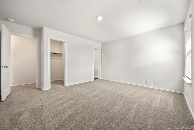 an empty room with a natural light