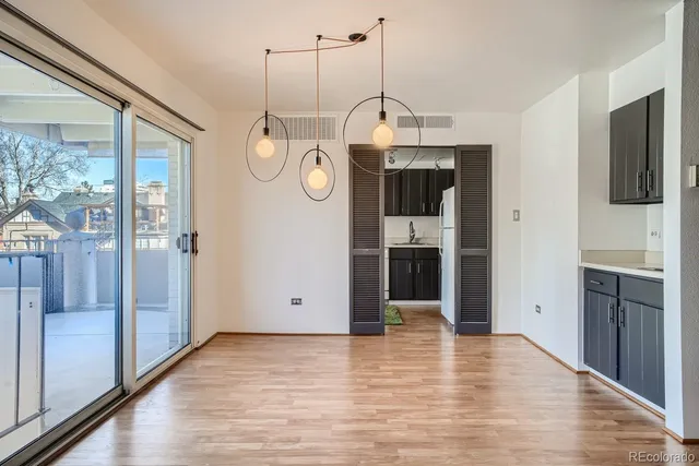 a outdoor living space with furniture and a potted plant