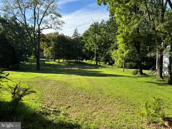 a view of a golf course with a trees