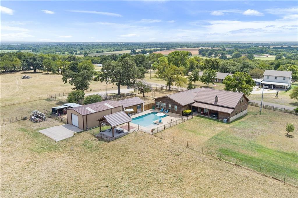 174 Ross Rd Spur Waco, TX 76705 - Photo 2 of 40 Main House, pool house plus mower shed,Gazebo, Large Shop, Barn, Storage shed, Greenhouse, Chicken Coop, and beehive box.