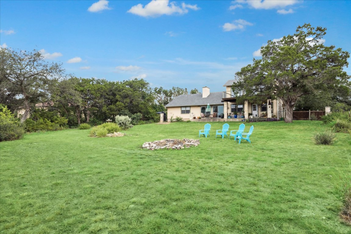 7806 Comanche Trail Leander, TX 78641 - Photo 30 of 32 a view of a house with a big yard