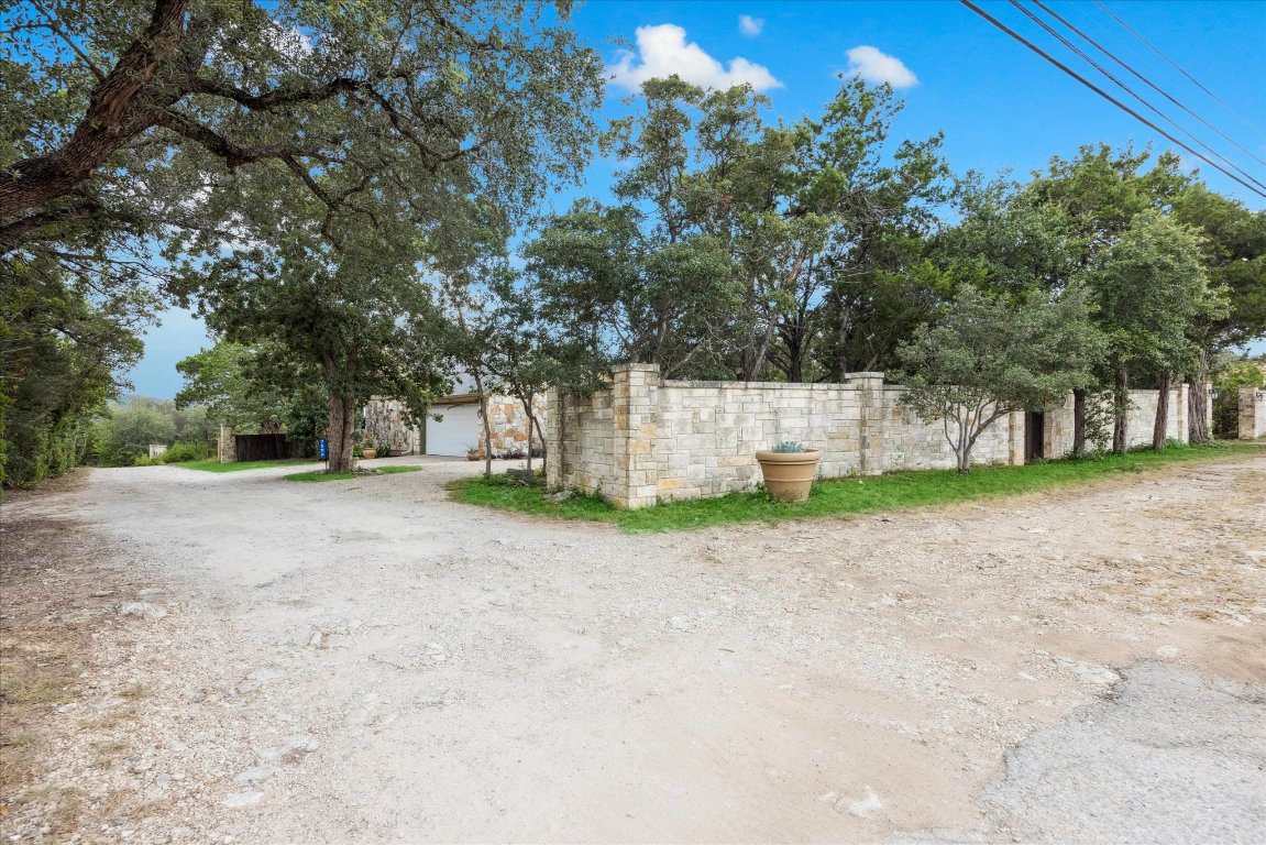 7806 Comanche Trail Leander, TX 78641 - Photo 6 of 32 a view of a house with a yard and tree s