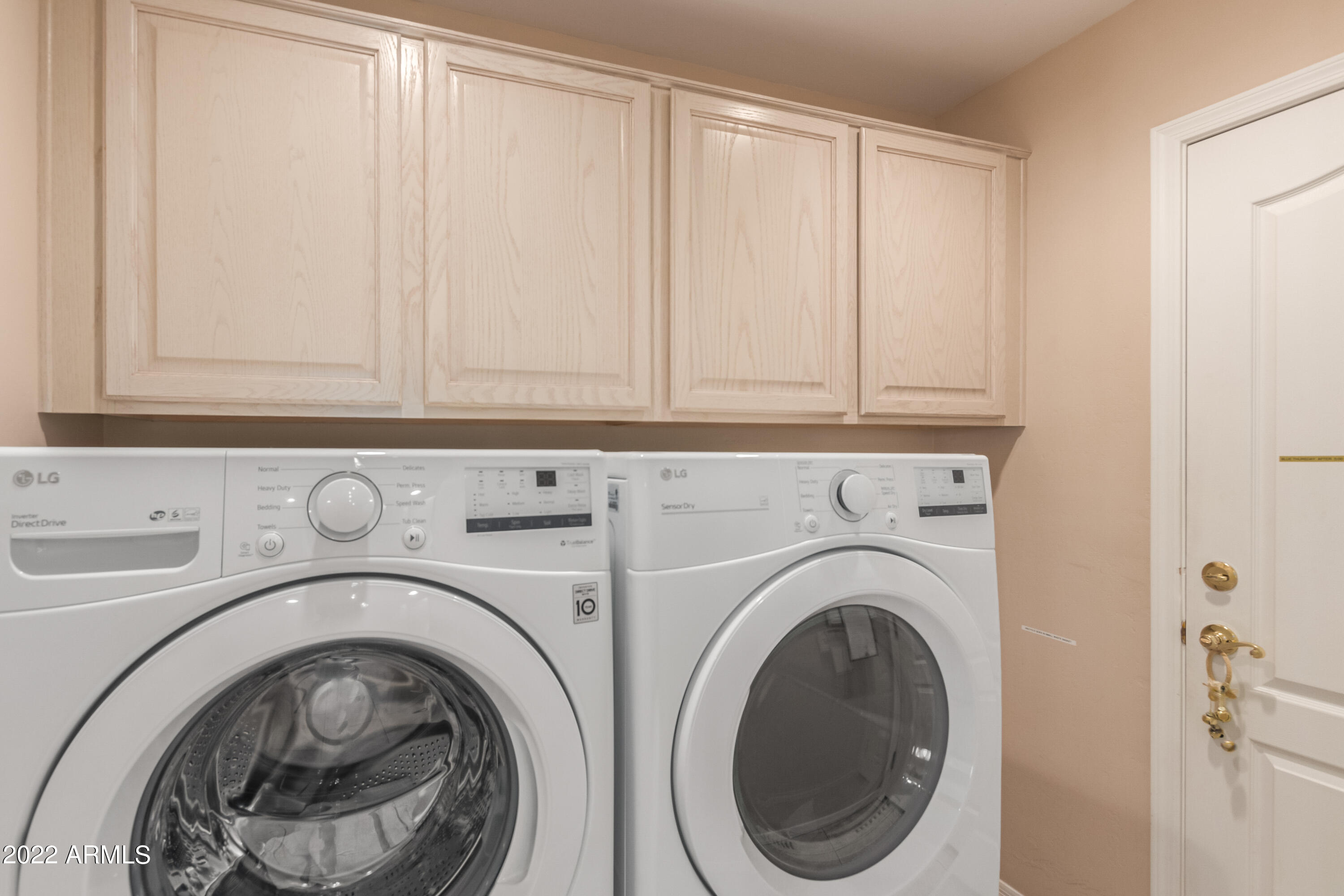 5830 East McKellips Road, Unit 76 Mesa, AZ 85215 - Photo 26 of 33 a utility room with dryer and washer